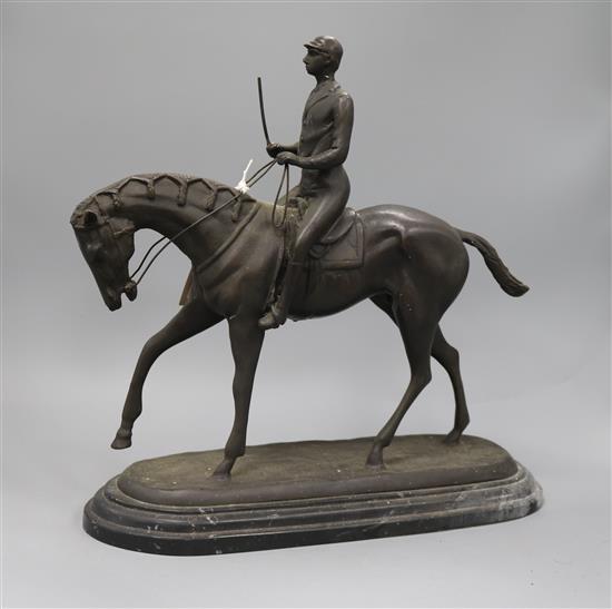 After Bonheur. A bronze jockey and rider, signed, height 39cm